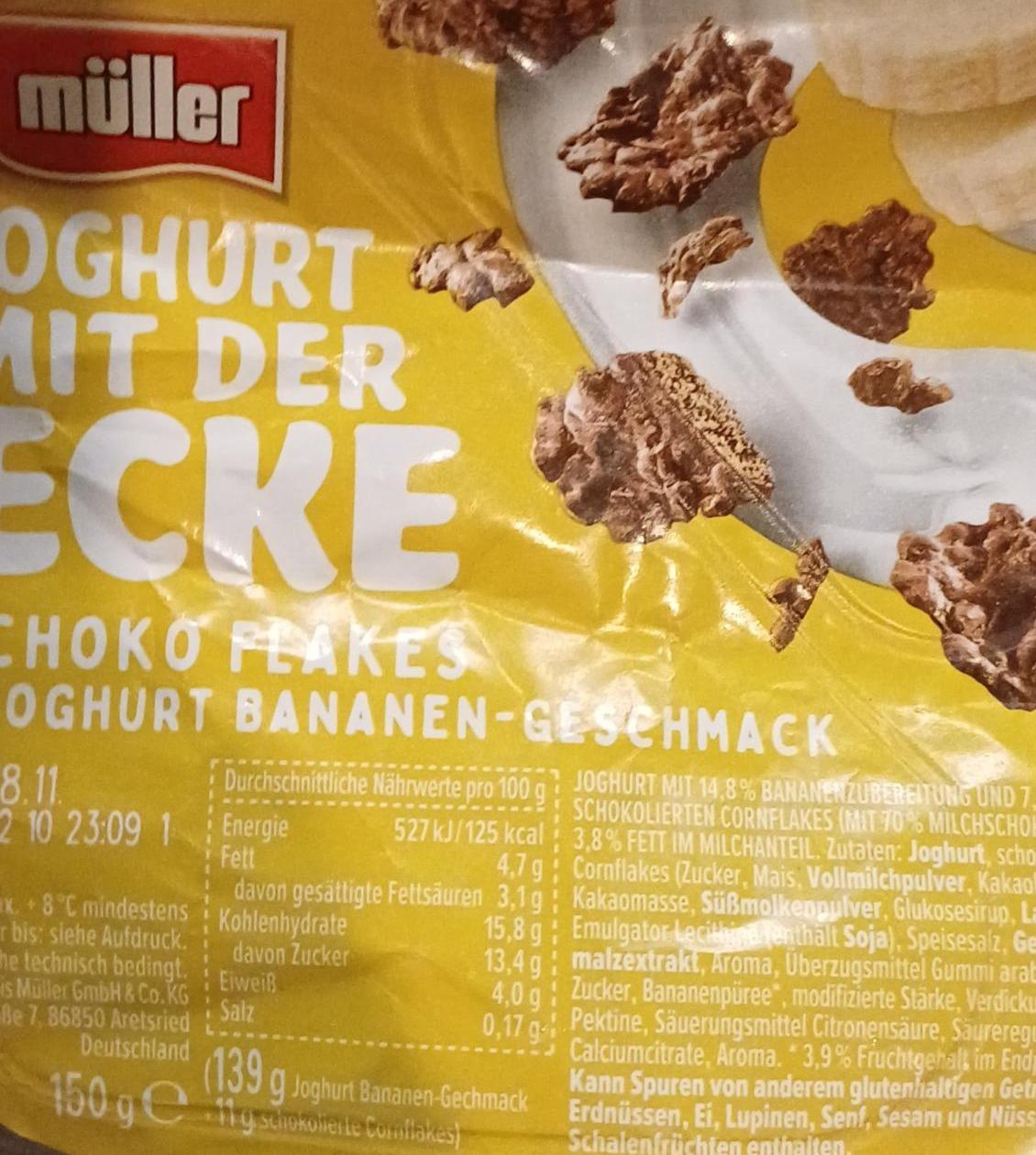 Zdjęcia - Joghurt mit der ecke schoko flakes bananen müller