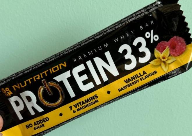 Zdjęcia - Protein 33% baton o smaku waniliwo-malinowym Go on nutrition