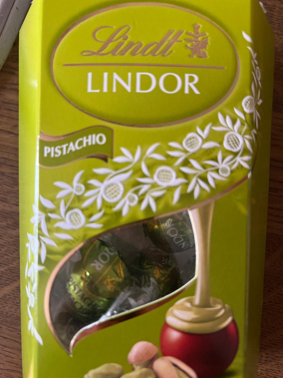 Zdjęcia - Lindt Lindor Praliny z czekolady mlecznej z pistacjowym nadzieniem 200 g