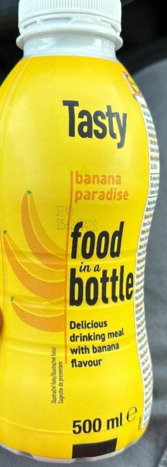 Zdjęcia - Tasty banana paradise food in a bottle Pilos