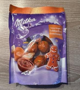 Zdjęcia - Milka Mini Snow Balls Cukierki z ciasteczkami korzennymi w czekoladzie mlecznej 90 g